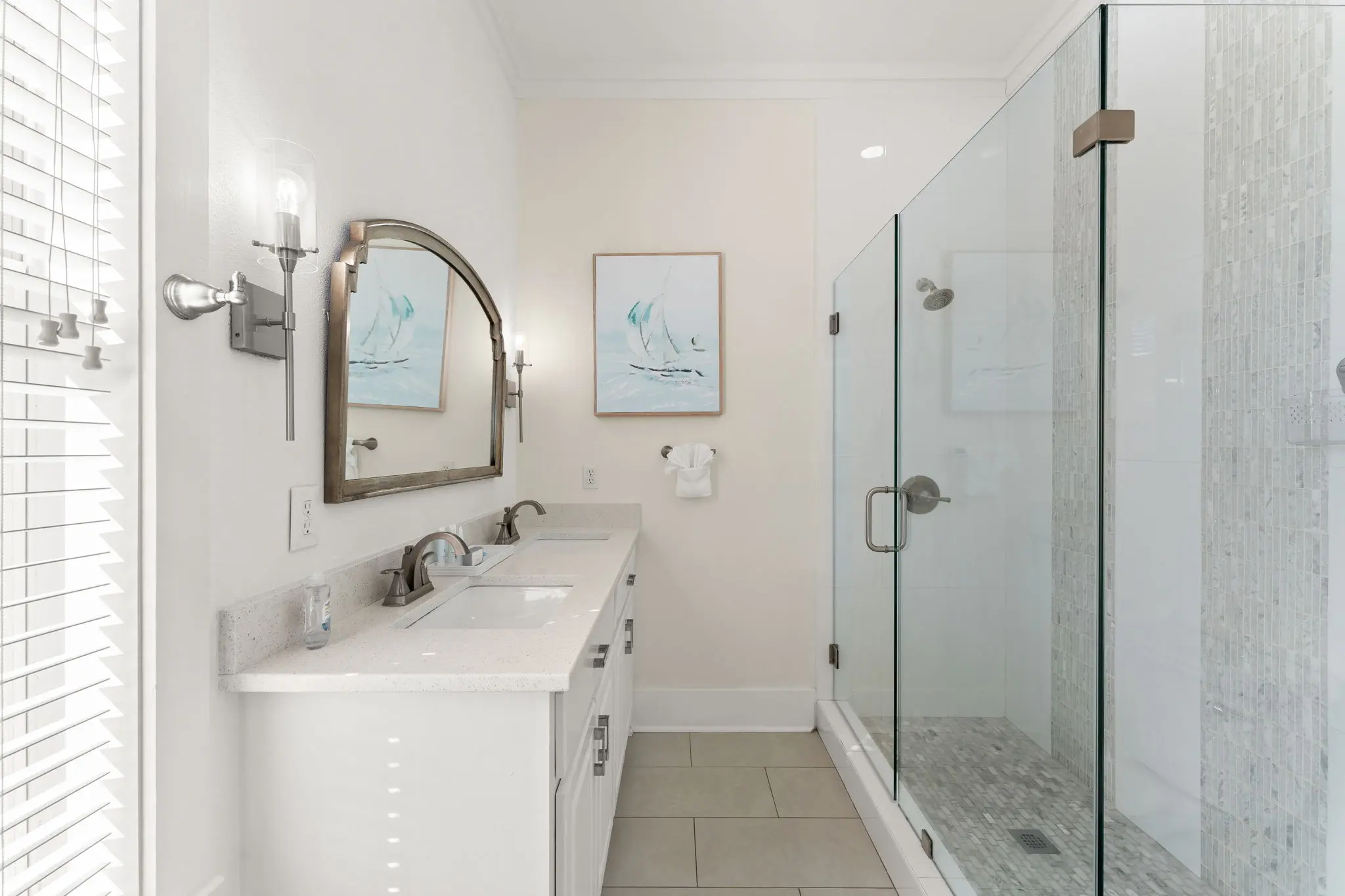 Master bathroom with double vanity and walk-in glass shower